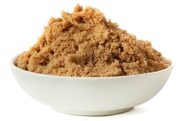 Bulk brown sugar ICUMSA 600-1200 packaged in 50kg bags for wholesale buyers.